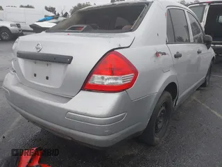 2010 Nissan Versa 1.6 with VIN 3N1CC1AP8AL393730, listed as a IAAI auction lot 41769285 with 204,981 mi miles. Bid and sale history available at carsss.com. Image 4.