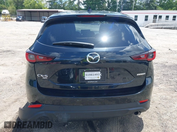 2023 Mazda CX-5 S Carbon Edition z VIN JM3KFBCMXP0201665, wystawiony jako IAAI lot #39965378 z przebiegiem 29 105 mil mil oraz . Historia ofert i sprzedaży dostępna na DreamBid. Obrazek 16.