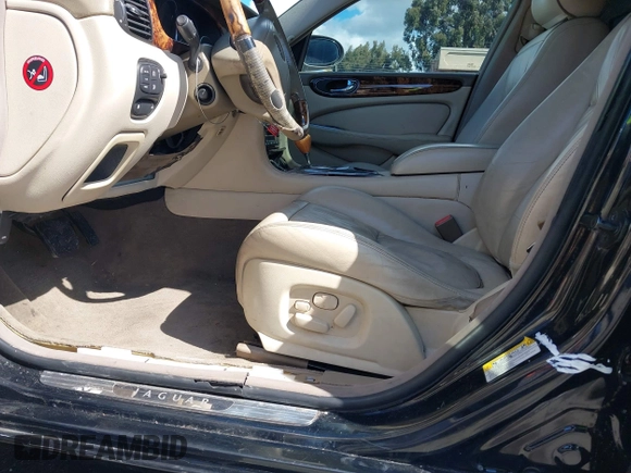 2004 Jaguar XJ with VIN SAJEA74C94SG11224, listed as a IAAI auction lot 41732975 with 204,815 mi miles and . Bid and sale history available at DreamBid. Image 6.