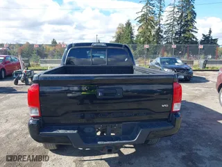 2016 Toyota Tacoma SR5 with VIN 5TFDZ5BN7GX001869, listed as a IAAI auction lot 40610002 with 184,380 mi miles. Bid and sale history available at carsss.com. Image 16.