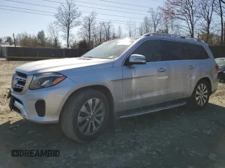 2019 Mercedes-Benz GLS 450 with VIN 4JGDF6EE8KB233053, listed as a Copart auction lot 49957755 with 68,676 mi miles and Salvage title. Bid and sale history available at DreamBid. Image 1.