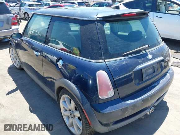 2006 MINI Hardtop S with VIN WMWRE33536TJ35740, listed as a IAAI auction lot 42720196 with 165,852 mi miles and . Bid and sale history available at DreamBid. Image 3.