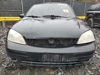 2005 Ford Focus with VIN 3FAHP31N65R146202, listed as a Copart auction lot 50226415 with 184,919 mi miles and Salvage title. Bid and sale history available at DreamBid. Image 5.