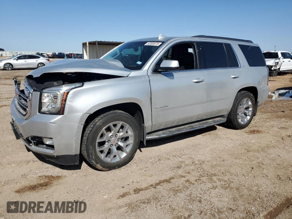 2017 GMC Yukon SLT with VIN 1GKS2BKC9HR345688, listed as a Copart auction lot 52303075 with 122,969 mi miles and Salvage Title. Bid and sale history available at carsss.com. Image 1.