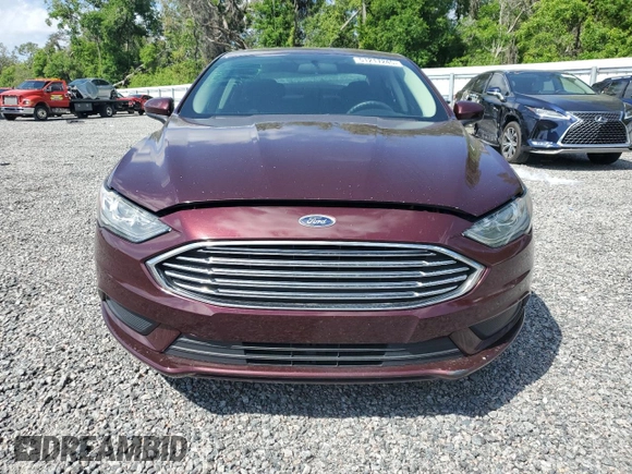 2018 Ford Fusion SE with VIN 3FA6P0H7XJR127739, listed as a Copart auction lot 51217245 with 111,392 mi miles and Salvage Title. Bid and sale history available at DreamBid. Image 5.