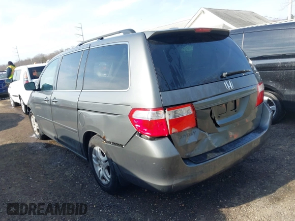 2007 Honda Odyssey EX-L z VIN 5FNRL38717B070328, wystawiony jako IAAI lot #41696829 z przebiegiem 171 229 mil mil oraz . Historia ofert i sprzedaży dostępna na DreamBid. Obrazek 3.