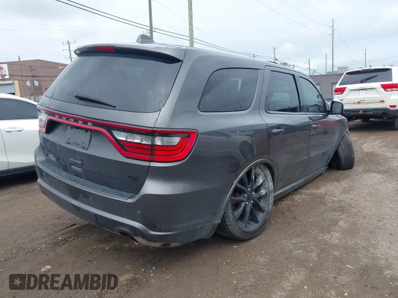2018 Dodge Durango R/T with VIN 1C4SDJCT0JC372124, listed as a IAAI auction lot 42259990 with 131,414 mi miles and . Bid and sale history available at DreamBid. Image 4.