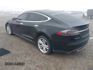 2014 Tesla Model S 60 with VIN 5YJSA1H1XEFP36008, listed as a IAAI auction lot 41287240 with 48,171 mi miles and . Bid and sale history available at DreamBid. Image 3.