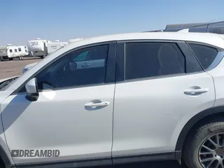 2017 Mazda CX-5 Sport with VIN JM3KFABL5H0124725, listed as a IAAI auction lot 40487298 with 103,889 mi miles. Bid and sale history available at carsss.com. Image 14.