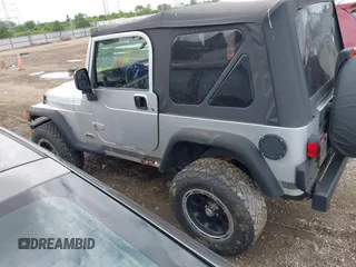 2004 Jeep Wrangler Sport with VIN 1J4FA49S44P772575, listed as a IAAI auction lot 42512876 with 226,387 mi miles and . Bid and sale history available at DreamBid. Image 15.