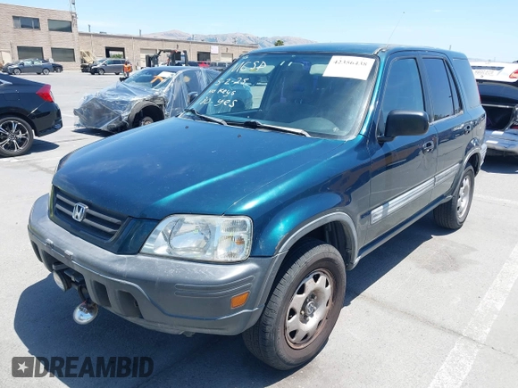 1998 Honda CR-V LX z VIN JHLRD1843WC083751, wystawiony jako IAAI lot #42356438 z przebiegiem 167 342 mil mil oraz . Historia ofert i sprzedaży dostępna na DreamBid. Obrazek 6.