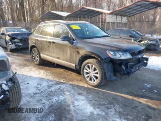 2014 Volkswagen Touareg Sport with VIN WVGEF9BP8ED005669, listed as a IAAI auction lot 41383920 with 146,786 mi miles and . Bid and sale history available at DreamBid. Image 1.