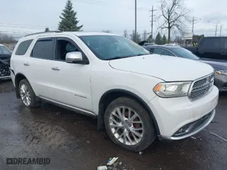 2014 Dodge Durango Citadel with VIN 1C4RDJEG0EC476018, listed as a IAAI auction lot 41212456 with 154,929 mi miles. Bid and sale history available at carsss.com. Image 1.
