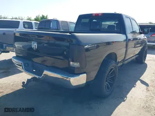 2009 Dodge Ram 1500 SLT with VIN 1D3HB18T19S764885, listed as a IAAI auction lot 41981930 with 157,536 mi miles. Bid and sale history available at carsss.com. Image 4.