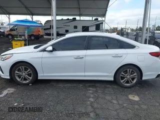 2018 Hyundai Sonata Sport with VIN 5NPE34AF8JH651873, listed as a IAAI auction lot 41777464 with 97,342 mi miles and . Bid and sale history available at carsss.com. Image 14.