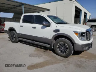 2017 Nissan Titan SL z VIN 1N6AA1E53HN508809, wystawiony jako Copart lot #47577705 z przebiegiem 50 888 mil mil oraz Szkoda całkowita • Salvage title. Historia ofert i sprzedaży dostępna na DreamBid. Obrazek 4.