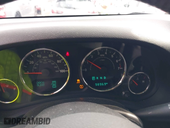 2015 Jeep Wrangler Unlimited Willys Wheeler with VIN 1C4BJWDG4FL687829, listed as a IAAI auction lot 42099147 with 98,969 mi miles and . Bid and sale history available at DreamBid. Image 7.