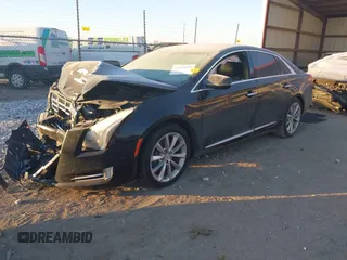 2014 Cadillac XTS Luxury with VIN 2G61M5S32E9289279, listed as a IAAI auction lot 41279495 with 106,655 mi miles. Bid and sale history available at carsss.com. Image 18.