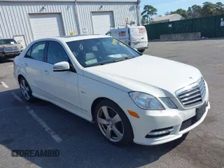 2012 Mercedes-Benz E-Class E 350 Luxury with VIN WDDHF8JB2CA619686, listed as a IAAI auction lot 42079521 with 129,025 mi miles. Bid and sale history available at carsss.com. Image 1.
