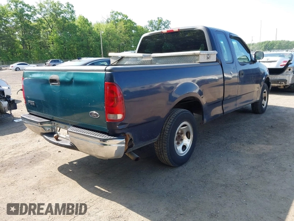 2000 Ford F-150 XL with VIN 1FTZX1723YNB00043, listed as a IAAI auction lot 42215601 with Not provided miles and . Bid and sale history available at DreamBid. Image 4.