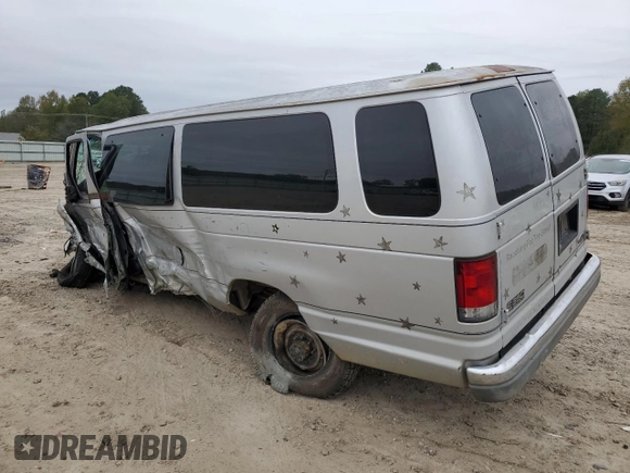 1999 Ford Econoline Passenger XL with VIN 1FBSS31L2XHB54786, listed as a Copart auction lot 80025474 with 418,665 mi miles and Clean Title. Bid and sale history available at DreamBid. Image 2.