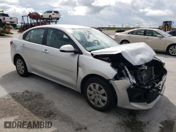 2022 Kia Rio LX with VIN 3KPA24AD2NE506127, listed as a Copart auction lot 63672404 with Not Provided miles and Salvage Title. Bid and sale history available at DreamBid. Image 4.