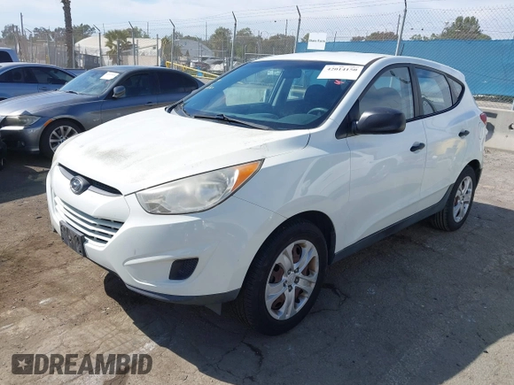 2010 Hyundai Tucson GLS with VIN KM8JT3AC7AU020547, listed as a IAAI auction lot 42014150 with 106,559 mi miles and . Bid and sale history available at DreamBid. Image 2.