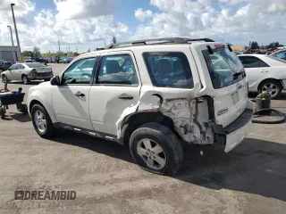 2011 Ford Escape XLS with VIN 1FMCU9C71BKC08406, listed as a Copart auction lot 61359975 with 182,954 mi miles and Salvage title. Bid and sale history available at DreamBid. Image 2.