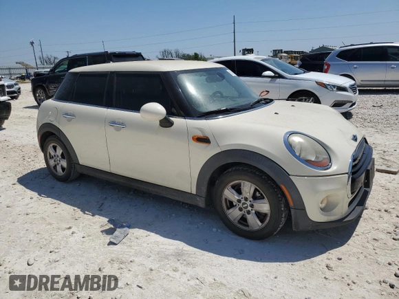 2017 MINI Hardtop 4 Door Cooper z VIN WMWXU1C59H2E18282, wystawiony jako Copart lot #51451895 z przebiegiem 118 919 mil mil oraz Szkoda całkowita • Salvage title. Historia ofert i sprzedaży dostępna na DreamBid. Obrazek 4.