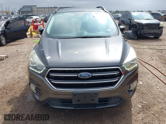 2017 Ford Escape SE with VIN 1FMCU0G99HUC65571, listed as a IAAI auction lot 41923517 with 77,179 mi miles and . Bid and sale history available at DreamBid. Image 12.