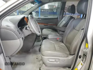 2010 Toyota Sienna XLE with VIN 5TDYK4CC0AS309461, listed as a Copart auction lot 51869275 with 156,598 mi miles and Salvage Title. Bid and sale history available at carsss.com. Image 7.