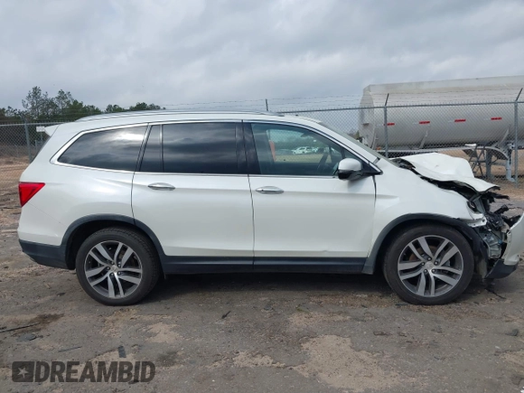 2017 Honda Pilot Elite with VIN 5FNYF6H04HB042192, listed as a IAAI auction lot 41780875 with 158,491 mi miles and . Bid and sale history available at DreamBid. Image 13.