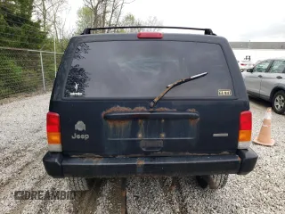 2001 Jeep Cherokee Sport с VIN 1J4FF48S31L615450, выставлен на аукционе Copart как лот 55835585 с пробегом 246 694 миль миль и Списание • Salvage title. История ставок и продаж доступна на DreamBid. Изображение 6.