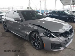 2021 BMW 5 Series 530e with VIN WBA13AG05MCF48300, listed as a IAAI auction lot 41735999 with 31,096 mi miles and . Bid and sale history available at carsss.com. Image 6.