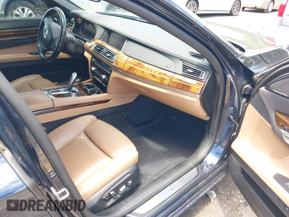 2015 BMW 7 Series 740i with VIN WBAYA6C59FD826726, listed as a IAAI auction lot 42254240 with 110,006 mi miles and . Bid and sale history available at DreamBid. Image 5.