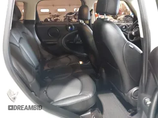 2016 MINI Countryman S with VIN WMWZC5C57GWU20085, listed as a IAAI auction lot 42403406 with 90,592 mi miles and . Bid and sale history available at DreamBid. Image 8.