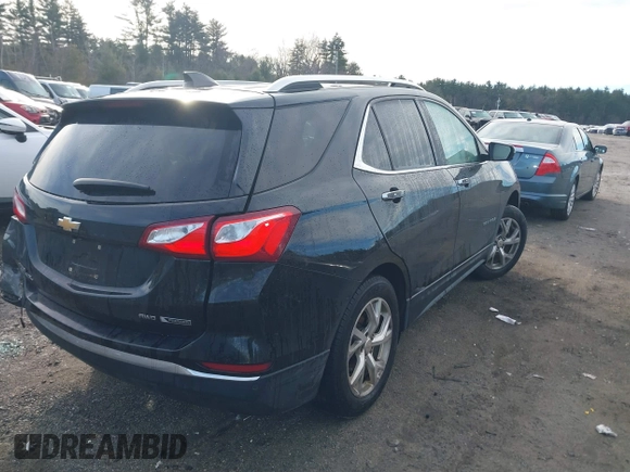 2018 Chevrolet Equinox Premier with VIN 2GNAXVEV7J6237540, listed as a IAAI auction lot 41201641 with 153,337 mi miles and . Bid and sale history available at DreamBid. Image 4.