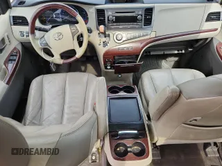 2011 Toyota Sienna XLE AAS with VIN 5TDYK3DC5BS081015, listed as a Copart auction lot 61096595 with 291,855 mi miles and Salvage title. Bid and sale history available at DreamBid. Image 8.