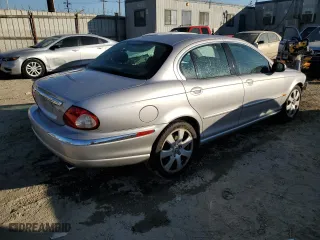 2005 Jaguar X-Type 3.0L with VIN SAJWA51C55WE31701, listed as a Copart auction lot 82908594 with 186,332 mi miles and Salvage Title. Bid and sale history available at carsss.com. Image 3.
