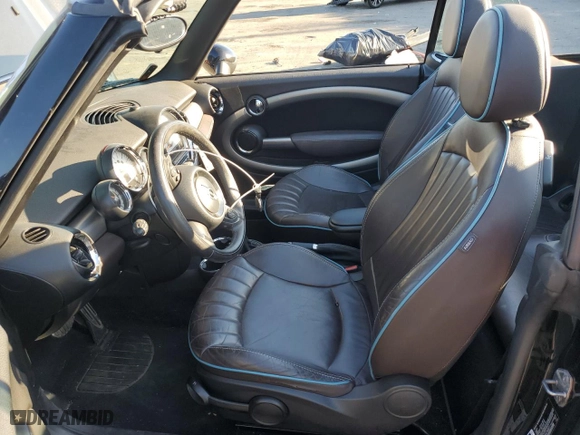 2012 MINI Cooper Convertible S with VIN WMWZP3C55CT550211, listed as a Copart auction lot 84225154 with 87,213 mi miles and Salvage Title. Bid and sale history available at carsss.com. Image 7.