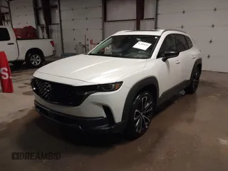 2023 Mazda CX-50 S Premium Plus with VIN 7MMVABEMXPN139186, listed as a IAAI auction lot 41289690 with 26,556 mi miles and . Bid and sale history available at DreamBid. Image 17.