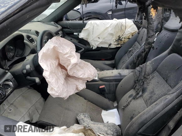 2019 Porsche 718 Boxster z VIN WP0CA2A87KS210113, wystawiony jako Copart lot #86159684 z przebiegiem Nie podano mil oraz Szkoda całkowita • Salvage title. Historia ofert i sprzedaży dostępna na DreamBid. Obrazek 7.