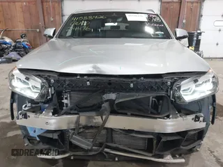 2020 BMW X2 xDrive28i with VIN WBXYJ1C09L5P35894, listed as a IAAI auction lot 41588426 with 24,476 mi miles. Bid and sale history available at carsss.com. Image 6.