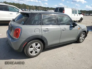 2016 MINI Hardtop 4 Door with VIN WMWXU1C55G2D09641, listed as a Copart auction lot 50567495 with 123,796 mi miles and Salvage Title. Bid and sale history available at DreamBid. Image 3.