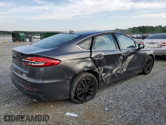 2020 Ford Fusion SE with VIN 3FA6P0HD0LR184251, listed as a Copart auction lot 57325205 with 99,142 mi miles and Salvage title. Bid and sale history available at DreamBid. Image 3.