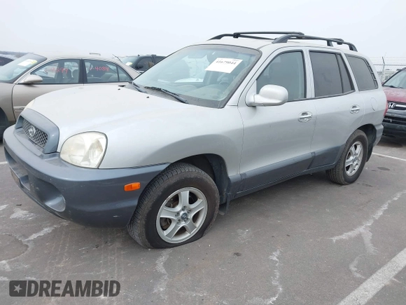 2003 Hyundai Santa Fe LX with VIN KM8SC73E83U568666, listed as a IAAI auction lot 41679044 with 127,560 mi miles. Bid and sale history available at carsss.com. Image 2.