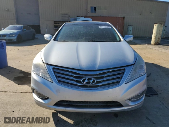 2014 Hyundai Azera Limited z VIN KMHFH4JG3EA360317, wystawiony jako Copart lot #79748564 z przebiegiem Nie podano mil oraz Szkoda całkowita • Salvage title. Historia ofert i sprzedaży dostępna na DreamBid. Obrazek 5.