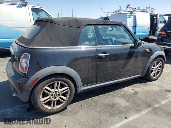 2015 MINI Convertible with VIN WMWZN3C56FT266838, listed as a Copart auction lot 50250745 with 60,331 mi miles and Salvage title. Bid and sale history available at DreamBid. Image 3.