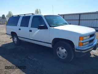 1999 Chevrolet Suburban z VIN 3GNFK16R4XG227995, wystawiony jako IAAI lot #42034142 z przebiegiem 241 792 mil mil oraz . Historia ofert i sprzedaży dostępna na DreamBid. Obrazek 1.
