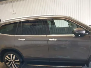 2017 Honda Pilot Touring with VIN 5FNYF6H91HB084737, listed as a IAAI auction lot 41608145 with 86,696 mi miles. Bid and sale history available at carsss.com. Image 13.